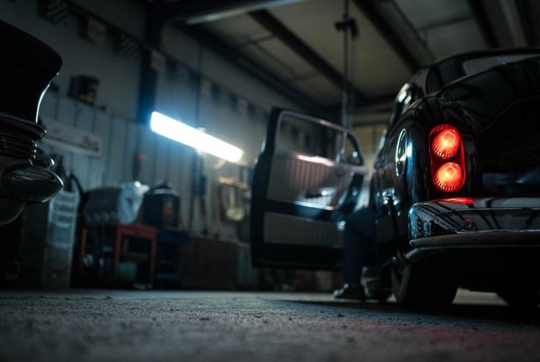 Car running in a garage